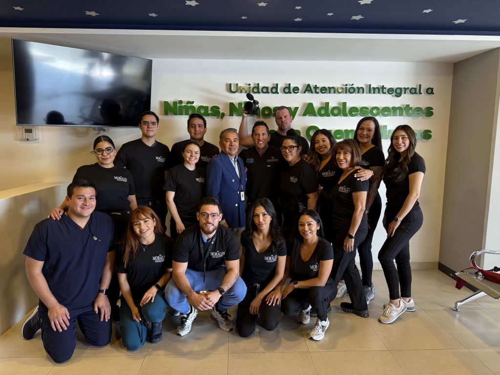 Dr. Morales with group on a mission trip